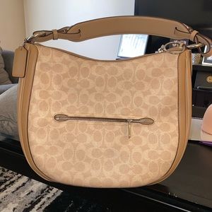 Slightly used coach bag. Worn once great condition!